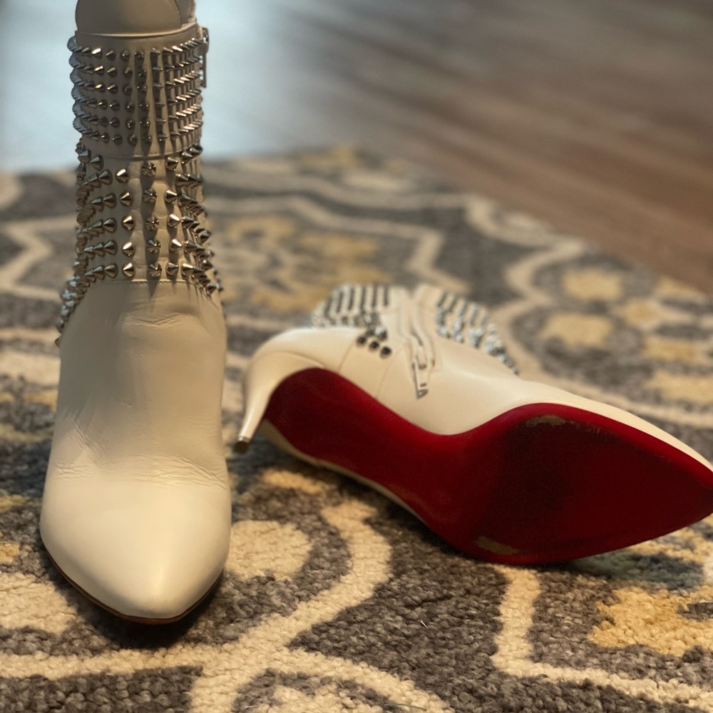 Christian Louboutin boots owned by Tori Kelly